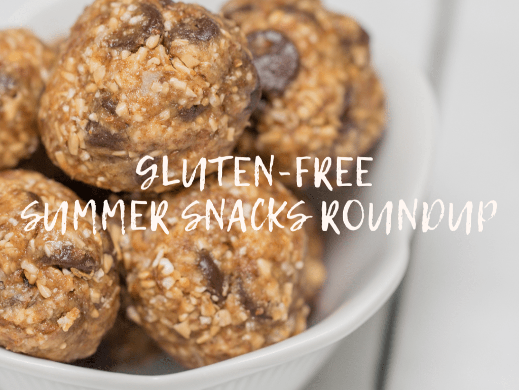 A close-up of gluten-free snack balls made with oats and chocolate chips, served in a white bowl, with text overlay reading 'Gluten-Free Summer Snacks Roundup'.